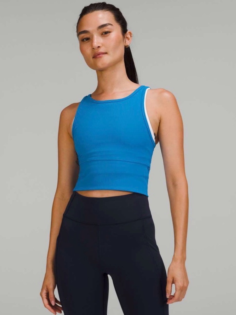 Lululemon Power Pivot Ribbed Tank Top
Poolside most likely size 2-4